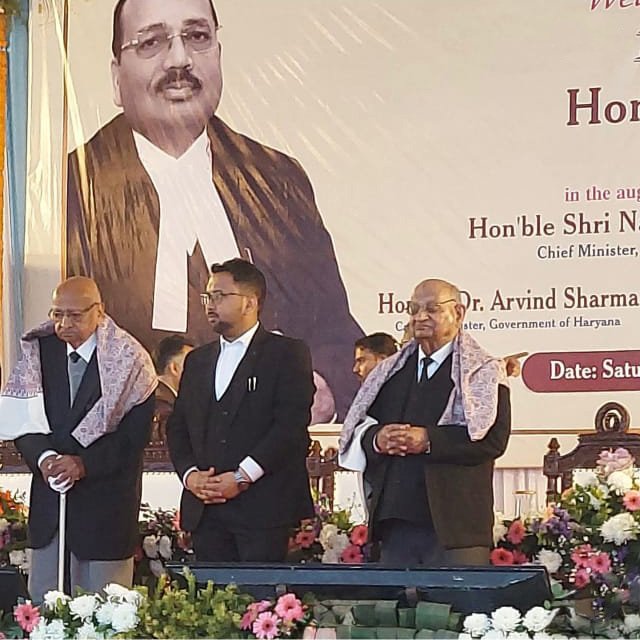Advocate Gaurav Gupta on stage with senior advocates at Rohtak District Courts